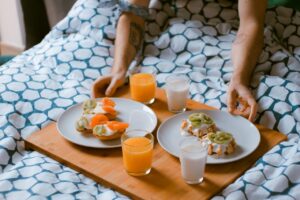 Breakfast in bed food service inside the apartment