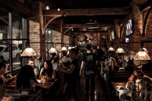 Group of people inside a cafe drinking 