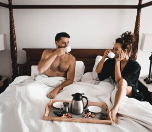 Man and woman drinking coffee together