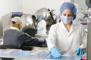 Group of people making chocolate 