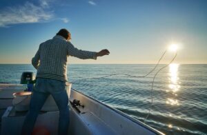 Man at the Boat Fishing