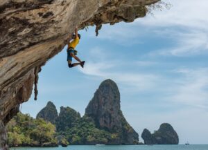 A man climbing the Rock