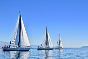 Three sailing boats in the sea