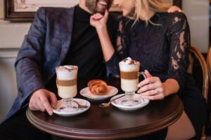 Two couples eating a dessert