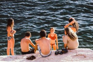 Family swimming in a beach resort