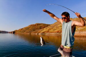 man catches a fish 