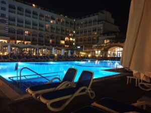 Outdoor pool at night in the resort.