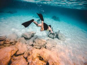 A man snorkelling 